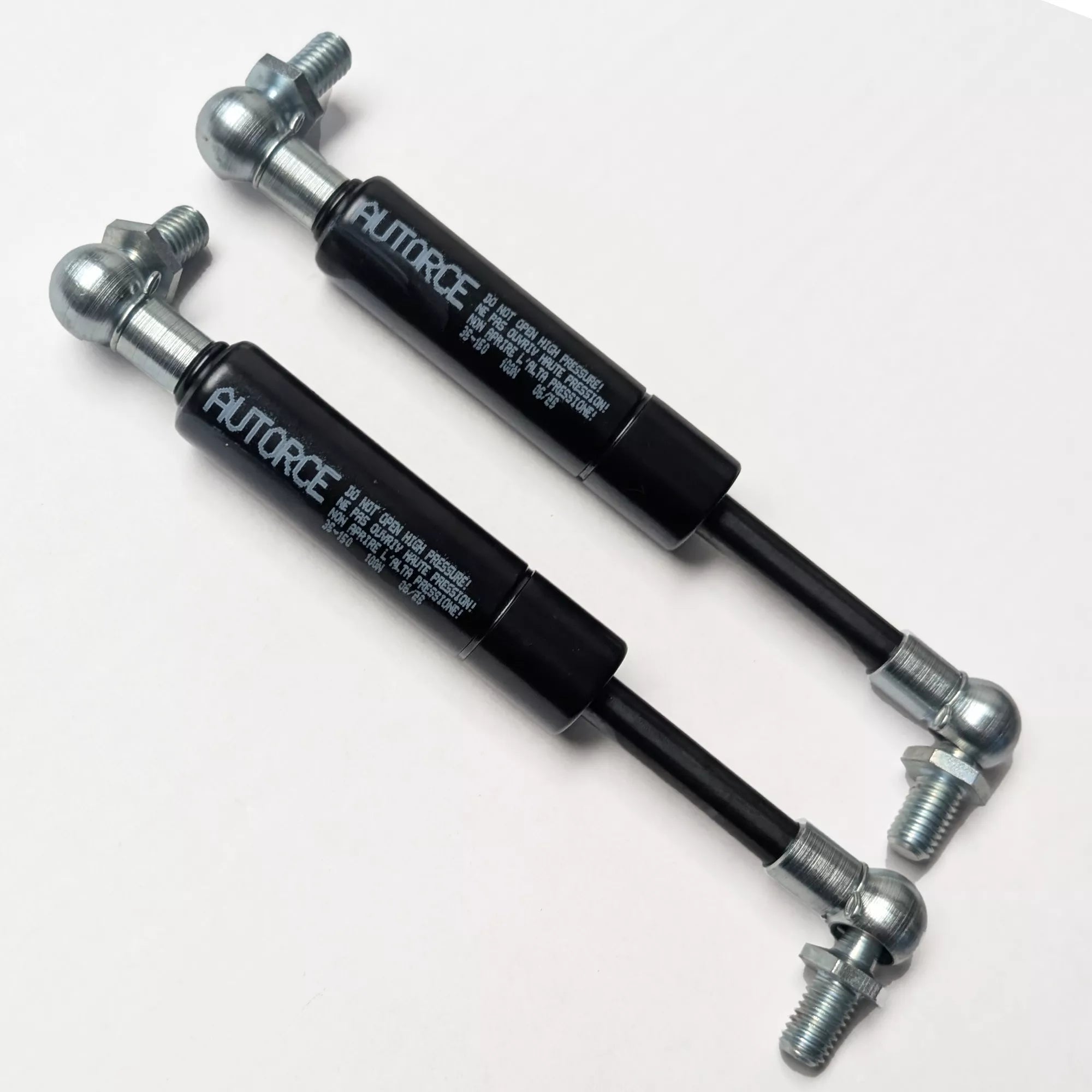 Pair of 100N gas struts with M6 ball joint fittings for furniture and hatch lift support